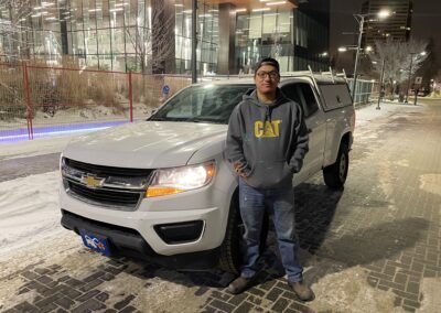 true north plumbing owner standing in front of his truck